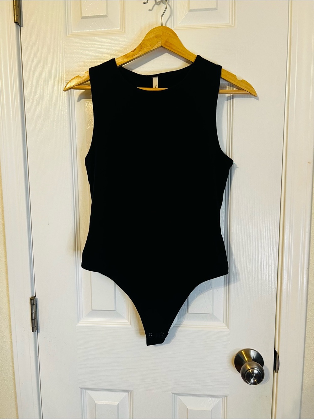 Babaton Black Sleeveless Kids One-Piece Bodysuit